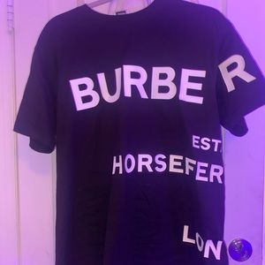 Black Burberry shirt women’s size small. retail 510.00 plus tax. comes with tags